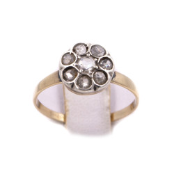 Anello in oro giallo con particolare centrale in argento e brillanti antichi