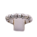 Anello in oro bianco con brillanti carati totali 0,20 e perline grigie