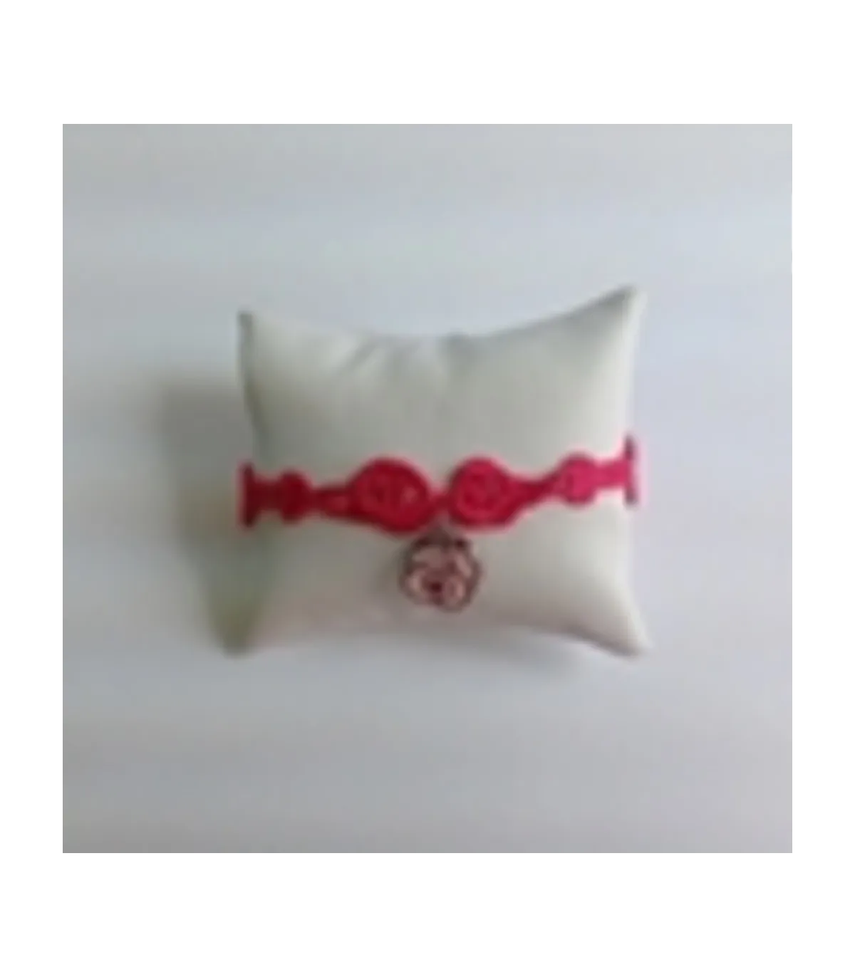 BRACCIALETTO CON CIONDOLO ROSA COLORE FUCSIA