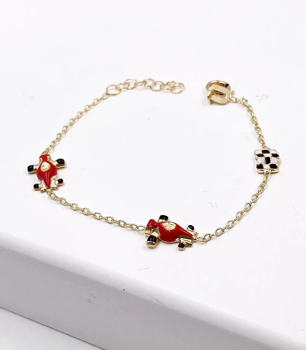 Bracciale da bimbo in oro giallo con macchinine