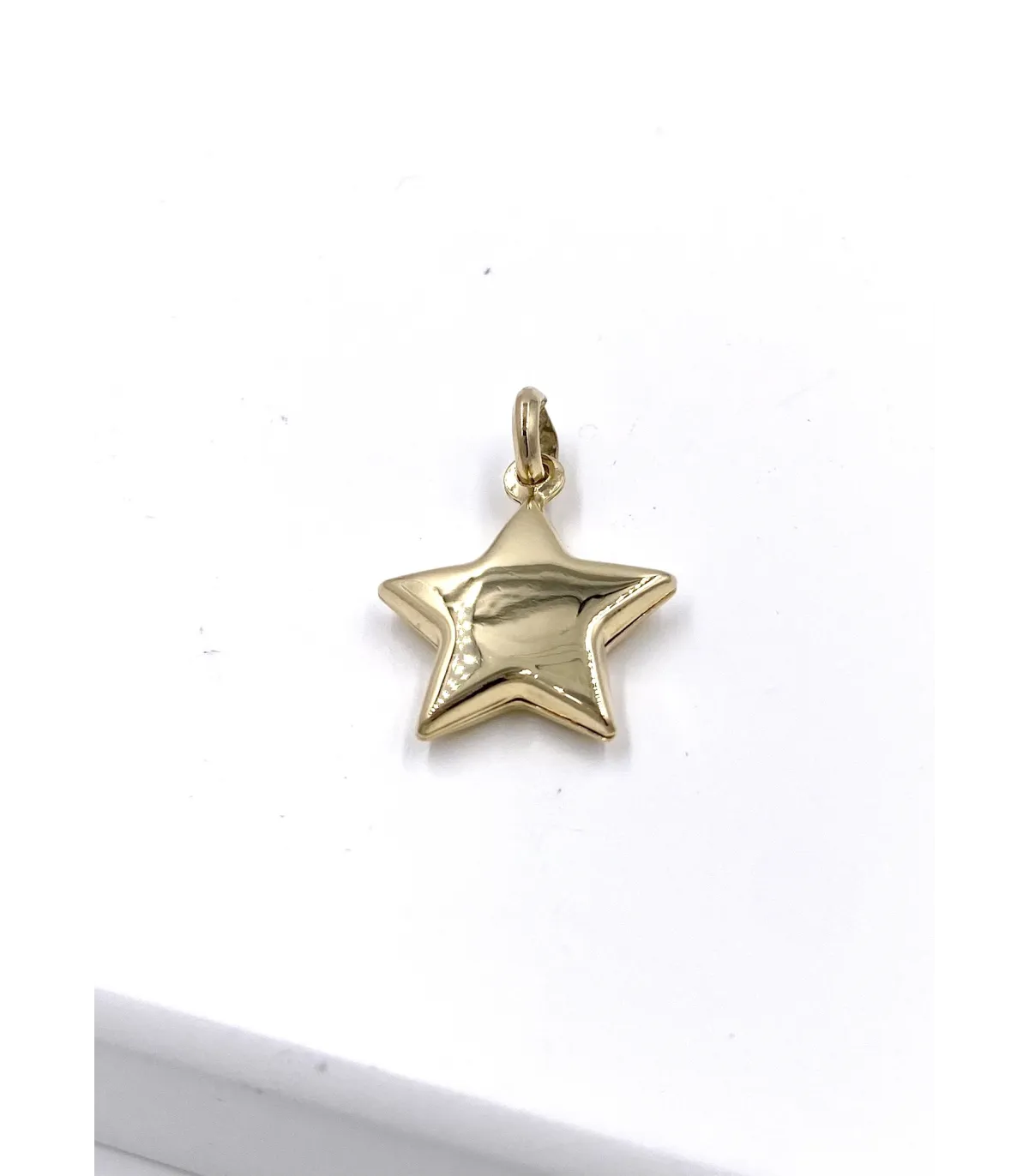 Ciondolo stella in oro giallo
