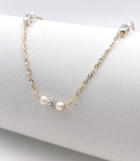 Collana in oro giallo con perle e sfere zirconate
