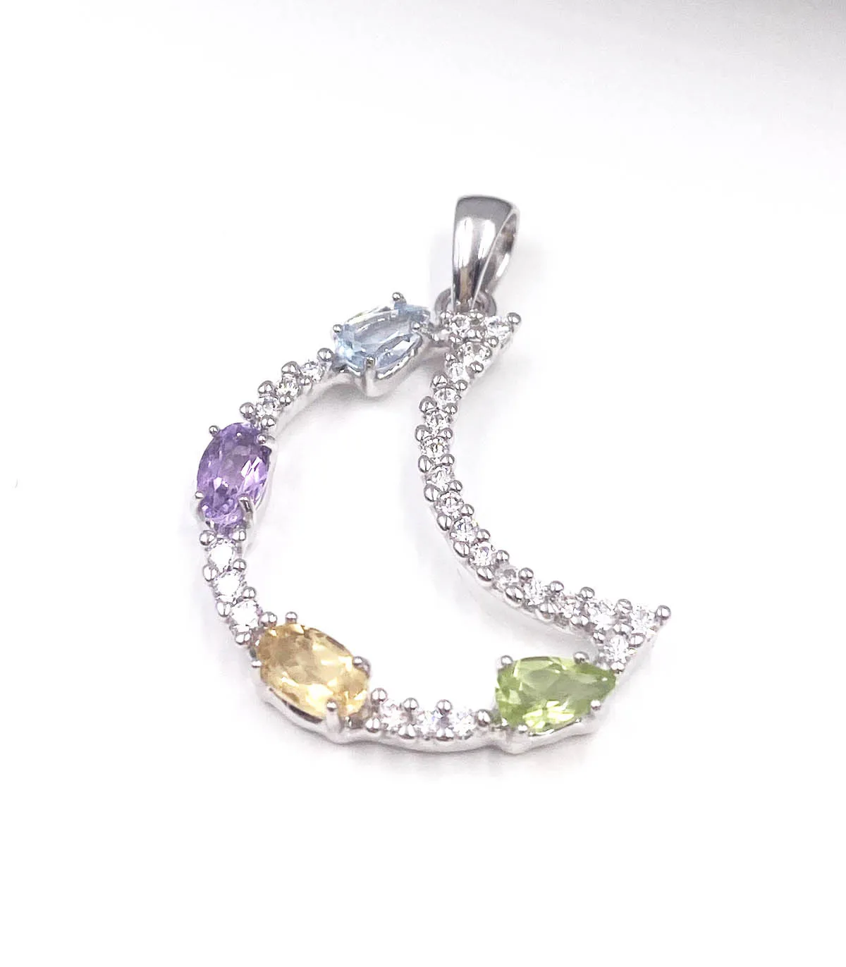 Ciondolo luna in oro bianco con zirconi bianchi e colorati