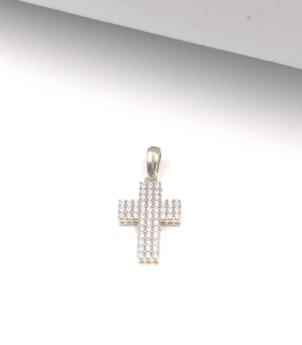 Ciondolo croce in oro giallo con zirconi