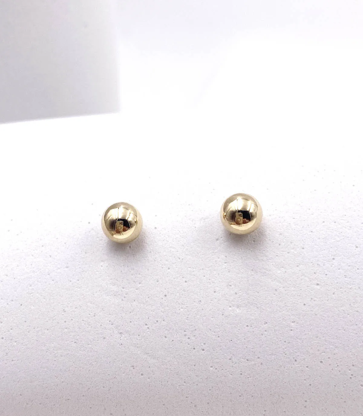 Orecchini a sfera in oro giallo