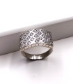 Anello a fascia in oro bianco con zirconi