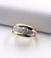 Anello in oro giallo e oro bianco a fascia con brillanti carati totali 0,07