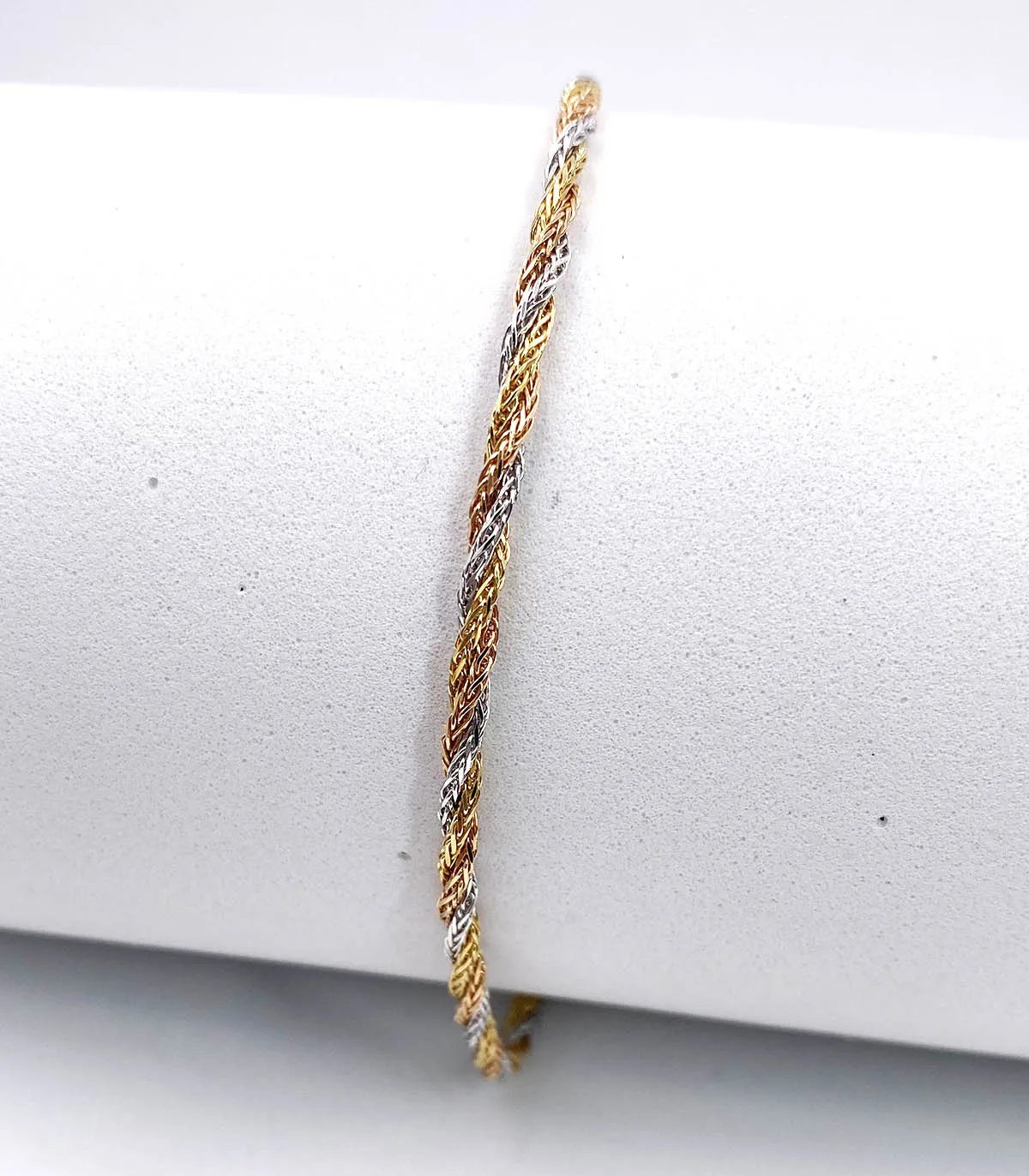 Bracciale torchon in oro giallo, bianco e rosso