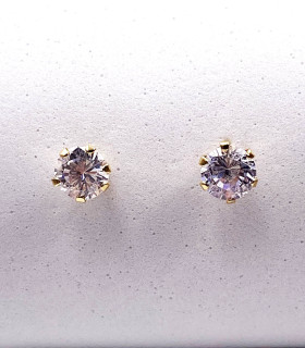 Orecchini punto luce in oro giallo con zirconi