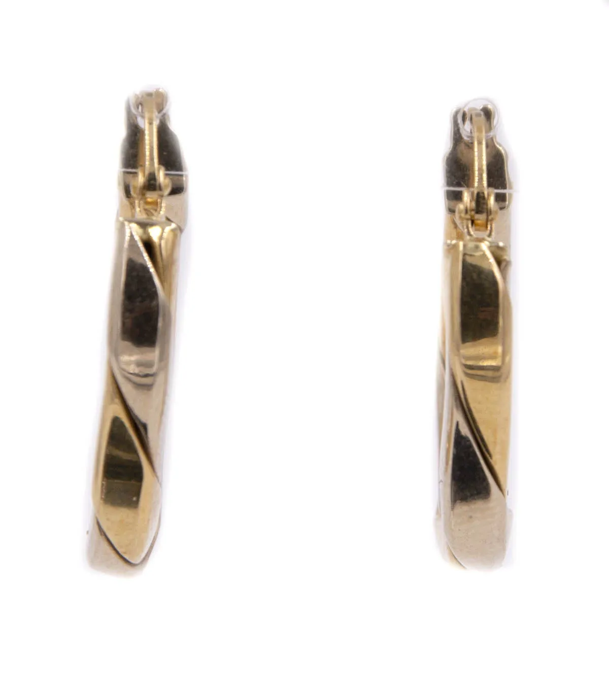 Orecchini a cerchio in oro bianco e oro giallo