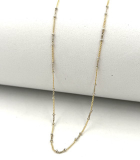 Collana in oro giallo con grani in oro bianco