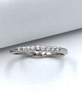 Anello veretta in oro bianco con zirconi