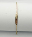 Bracciale in oro giallo con targhetta