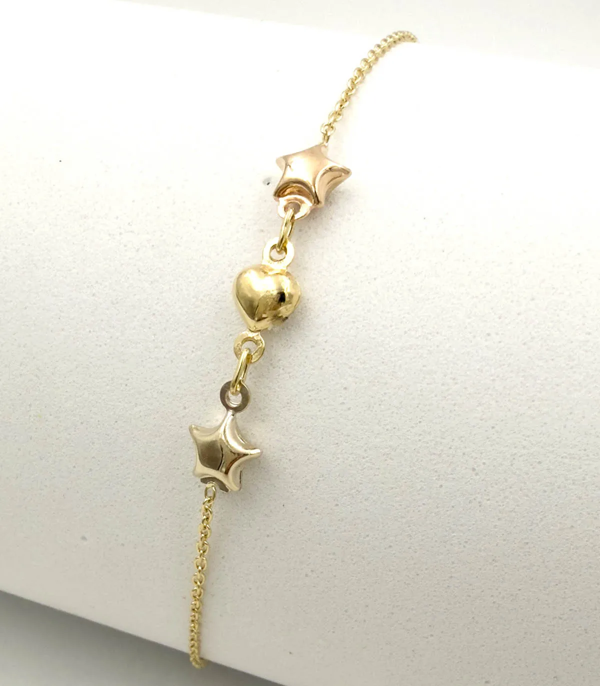 Bracciale in oro giallo da bimba con stelle e cuore