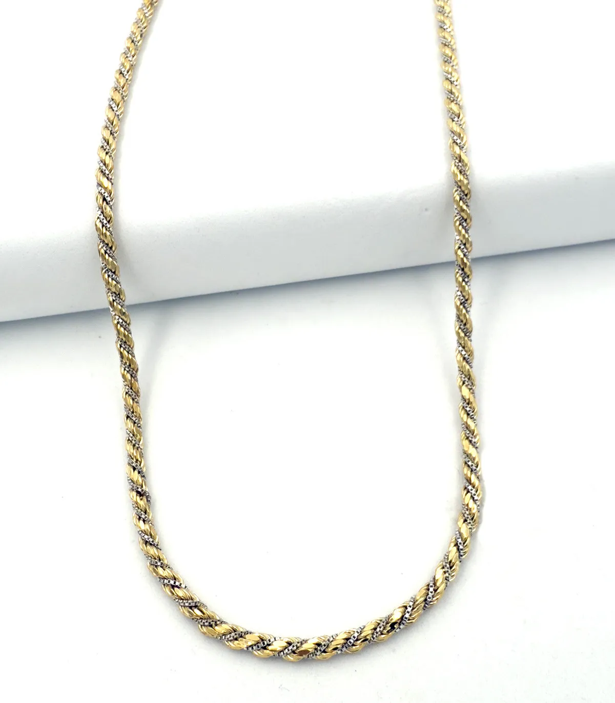 Collana torchon in oro bianco e oro giallo