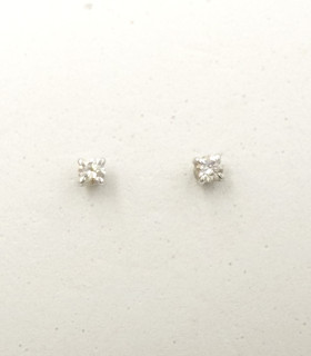 Orecchini punto luce in oro bianco con brillanti carati totali 0,16