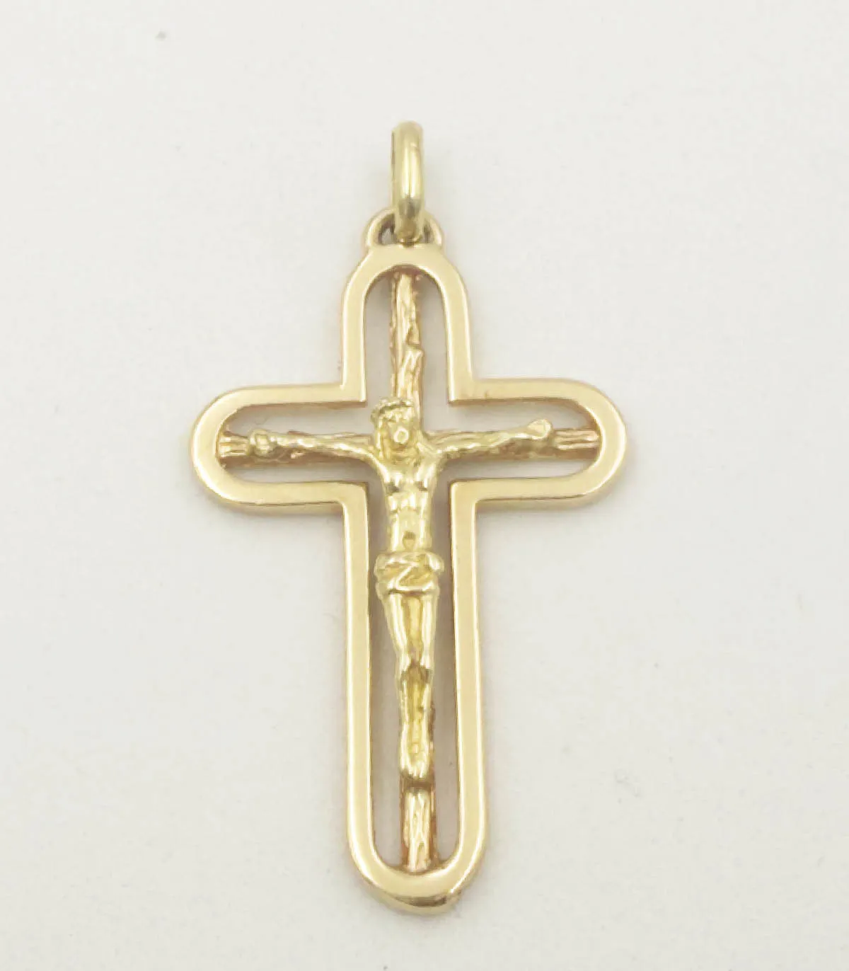 Ciondolo croce in oro giallo con Cristo