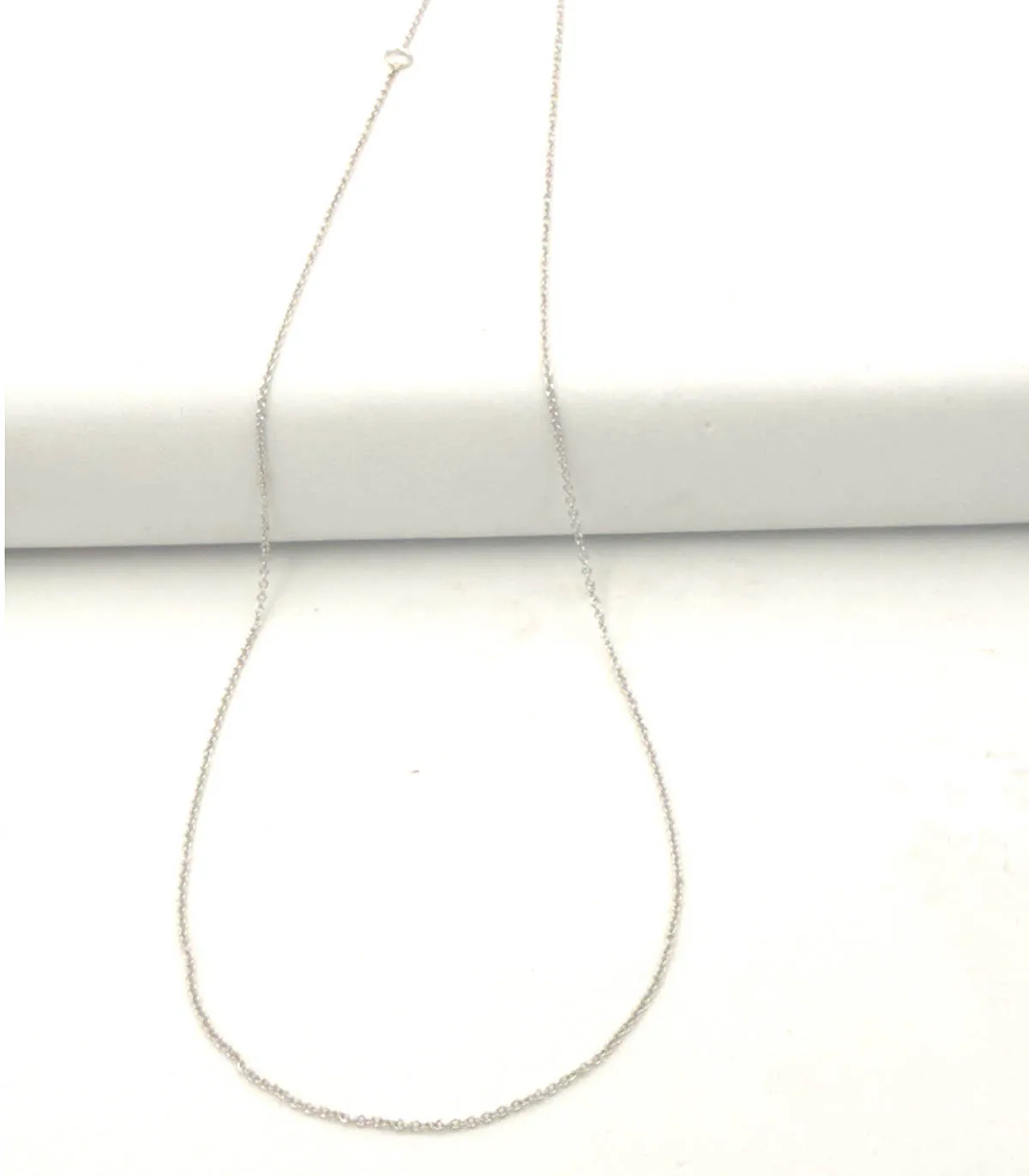 Collana rolò in oro bianco