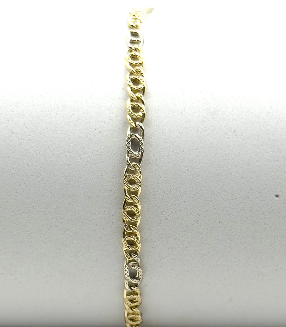 Bracciale da uomo in oro giallo e oro bianco martellato maglia 3 + 1