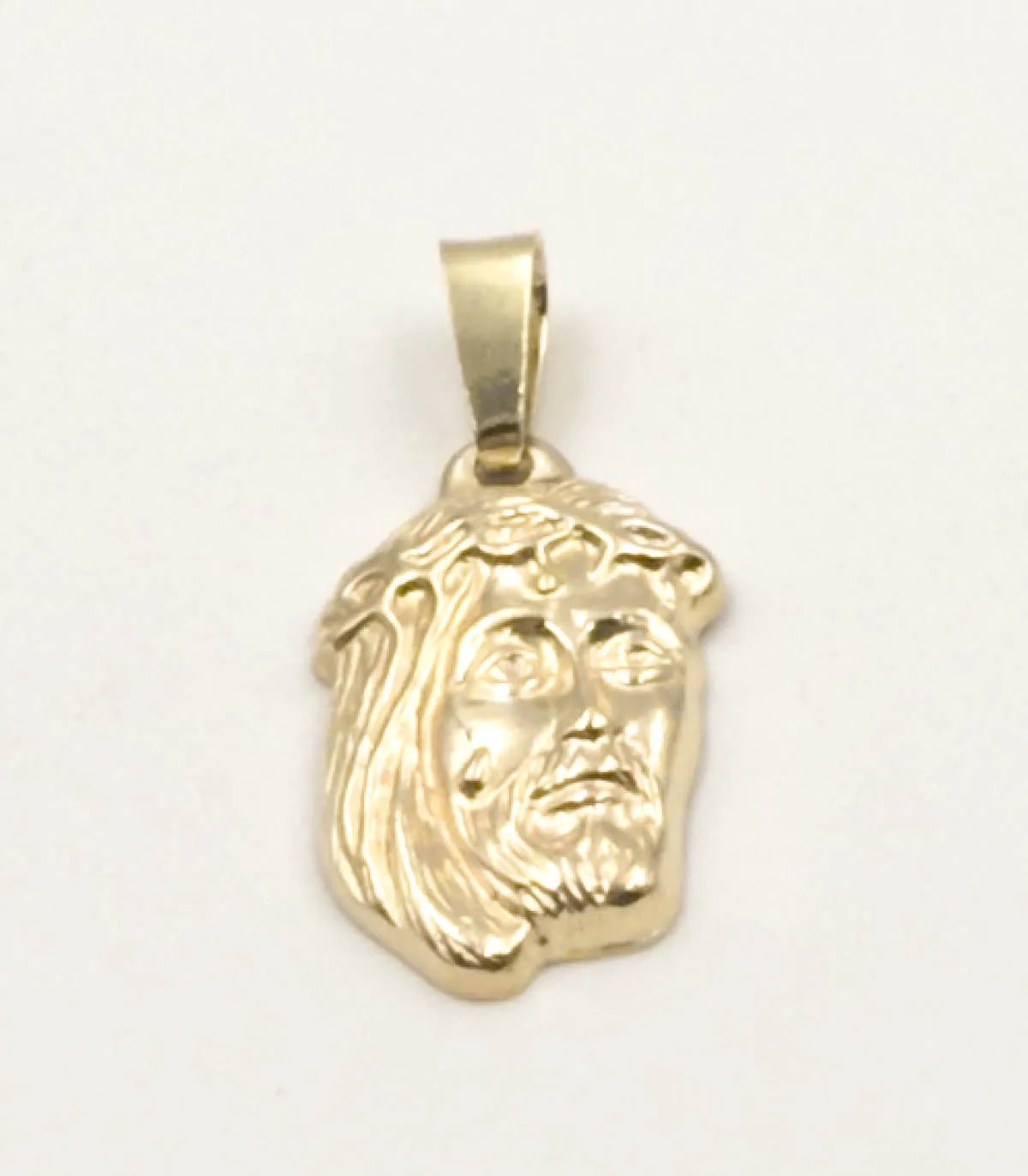Ciondolo volto di Cristo in oro giallo
