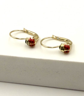 Orecchini a monachina in oro giallo con coccinella