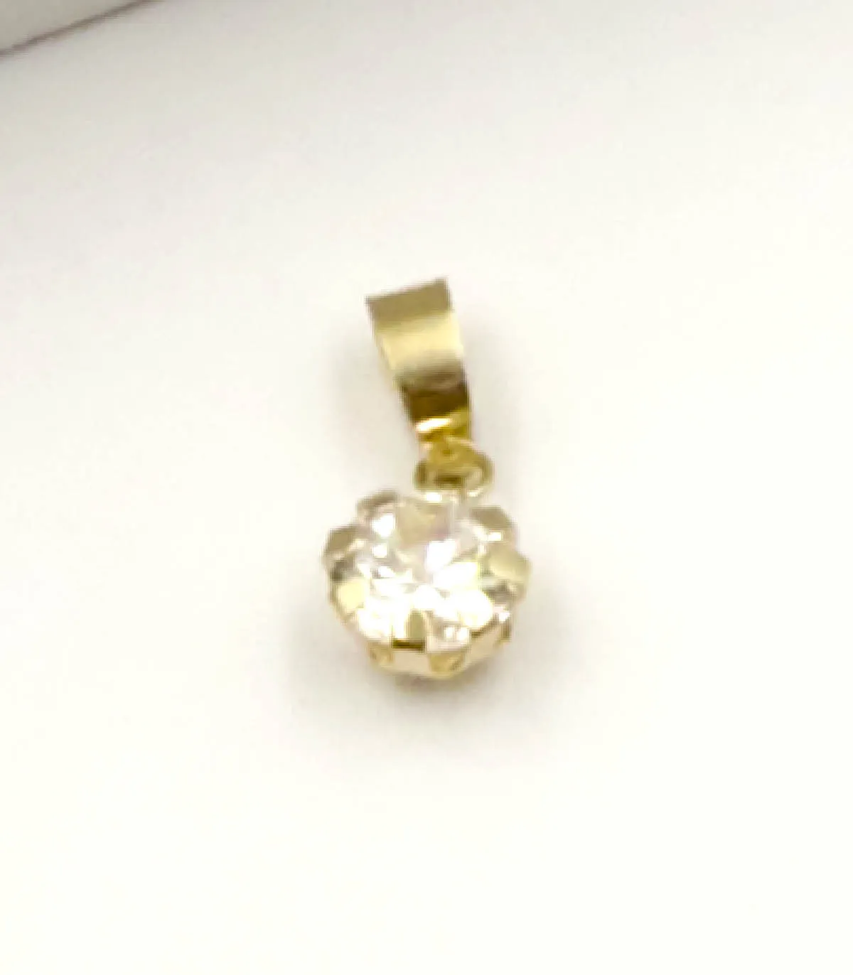 Ciondolo punto luce in oro giallo con zircone