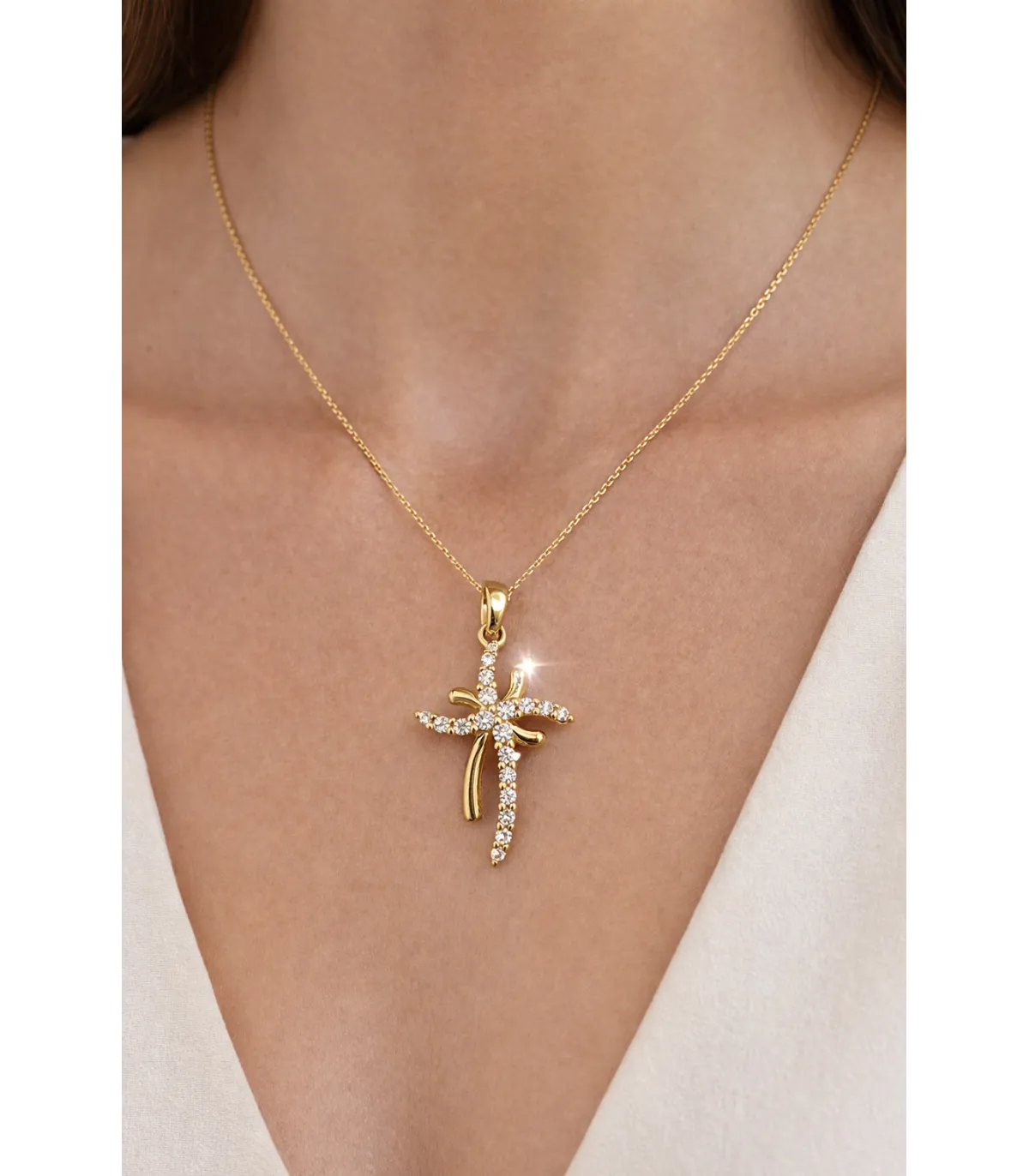 Ciondolo croce in oro giallo con zirconi