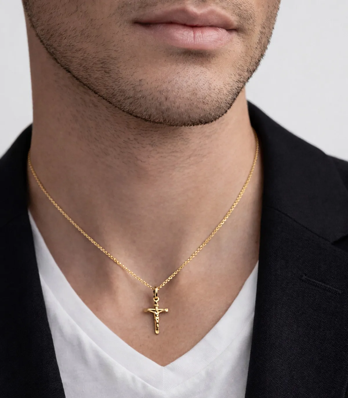 Ciondolo croce in oro giallo con Cristo