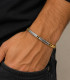 Bracciale semirigido in oro giallo con particolari in oro bianco