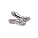 Anello in oro bianco a serpente con brillanti carati totali 0,09